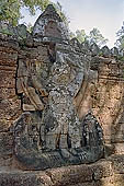 Preah Khan temple - gigantic sandstone garuda on the fourth enclosurewall (west entrance), 